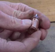 13,1 Chauffage_solaire_version_ardoise_verin_et_anneaux_cuivre_2_2.png